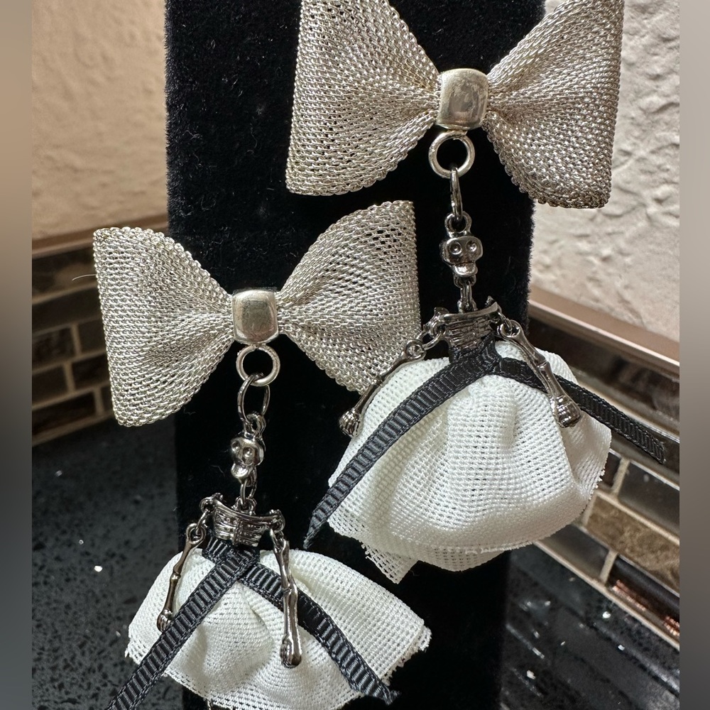 Bow tie skeleton earrings